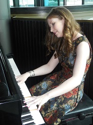 Liz playing piano